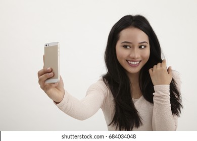 Malay Woman Selfie On The White Background