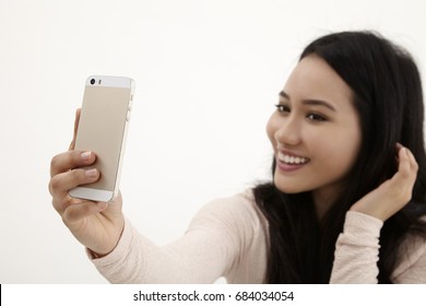 Malay Woman Selfie On The White Background