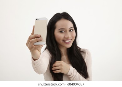 Malay Woman Selfie On The White Background