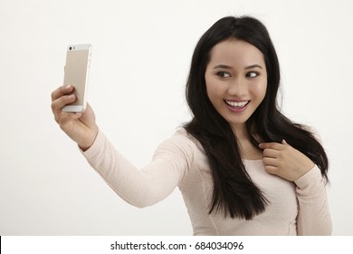 Malay Woman Selfie On The White Background