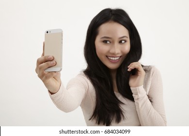 Malay Woman Selfie On The White Background