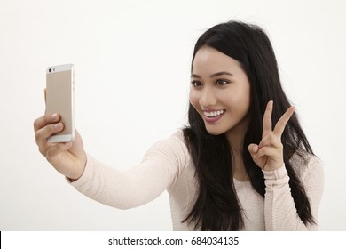 Malay Woman Selfie On The White Background