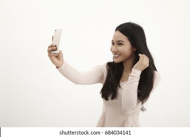 Malay Woman Selfie On The White Background