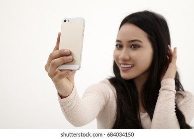 Malay Woman Selfie On The White Background