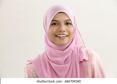 Malay Woman With Tudung Sitting Facing Camera