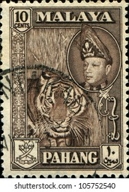 MALAYA - CIRCA 1957-61: A Stamp Printed In State Of Pahang In The East Coast Region Of Malaya Shows Tiger And Sultan Abu Bakar, Series, Circa 1957-61