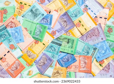 Malaysia currency of Malaysian ringgit banknotes background. Paper money of one, five, ten, twenty, fifty and hundred ringgit notes. Financial concept.