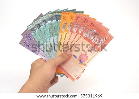 Malaysia Currency (MYR): Stack of Ringgit Malaysia bank note with isolated white background. There are ten, twenty, fifty and hundred ringgit malaysia.