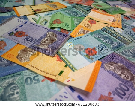 Malaysia Currency (MYR): Stack of Ringgit Malaysia bank note. There are one, ten, twenty, fifty and hundred ringgit malaysia.