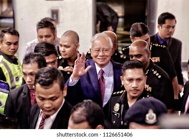 Malaysia, Kuala Lumpur - July 04, 2018 : Former Malaysian Prime Minister Najib Razak (c-red Tie) Is Surrounded As He Leaves The Duta Court Complex After Posting Bail In.