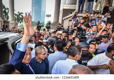 Malaysia, Kuala Lumpur - July 04, 2018 : Former Malaysian Prime Minister Najib Razak (c-red Tie) Is Surrounded As He Leaves The Duta Court Complex After Posting Bail In.