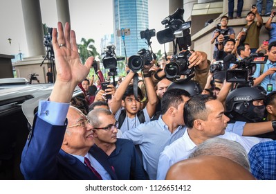 Malaysia, Kuala Lumpur - July 04, 2018 : Former Malaysian Prime Minister Najib Razak (c-red Tie) Is Surrounded As He Leaves The Duta Court Complex After Posting Bail In.