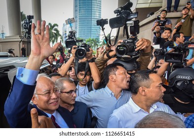 Malaysia, Kuala Lumpur - July 04, 2018 : Former Malaysian Prime Minister Najib Razak (c-red Tie) Is Surrounded As He Leaves The Duta Court Complex After Posting Bail In.