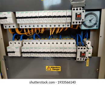 Malaysia, Penang, 11 March 2021 : Image Of An Electrical Breaker, Timer And Contactor In A Panel Board. 