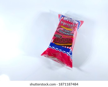 Malaysia, Perak, 9 December 2020: Selective Focus.Gardenia Squiggle Cream Core Bread Funky Strawberry Isolated On White Background.