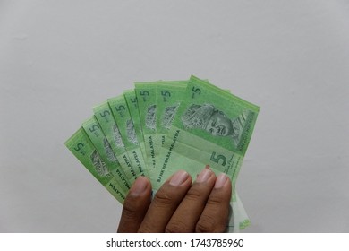 Malaysia Ringgit (MYR) with isolated background in selective focus. 