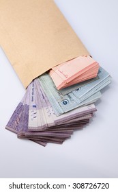 Malaysia rinngit in a envelope - Shutterstock ID 308726720