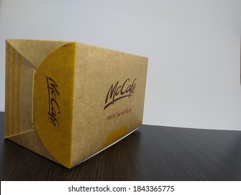 Malaysia, Sabah, 29.Oct.2020 : Box Cake By Secret Recipe Review Brand Of McCafe Mcdonald's Insolated On A White And Black Background.