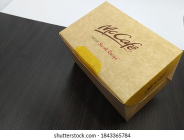 Malaysia, Sabah, 29.Oct.2020 : Box Cake By Secret Recipe Review Brand Of McCafe Mcdonald's Insolated On A White And Black Background.