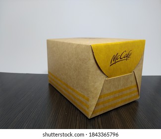 Malaysia, Sabah, 29.Oct.2020 : Box Cake By Secret Recipe Review Brand Of McCafe Mcdonald's Insolated On A White And Black Background.