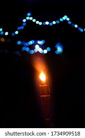 Malaysia Traditional Celebratory Oil Lamps Burning In Low Lighting (Lampu Pelita)