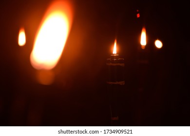 Malaysia Traditional Celebratory Oil Lamps Burning In Low Lighting (Lampu Pelita)