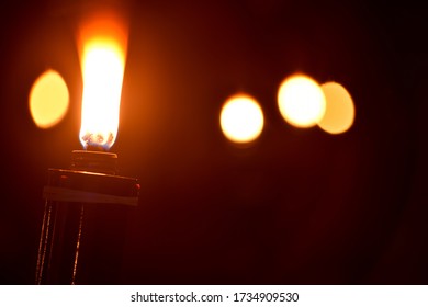 Malaysia Traditional Celebratory Oil Lamps Burning In Low Lighting (Lampu Pelita)