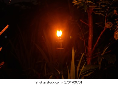 Malaysia Traditional Celebratory Oil Lamps Burning In Low Lighting (Lampu Pelita)