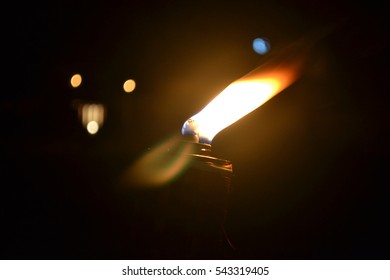 Malaysia Traditional Celebratory Oil Lamps Burning In Low Lighting (Lampu Pelita)