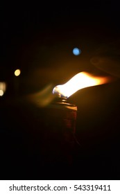 Malaysia Traditional Celebratory Oil Lamps Burning In Low Lighting (Lampu Pelita)