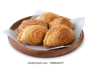 Malaysian deep fried curry puff or epok-epok isolated on white background with clipping path. Curry puff or epok-epok is Asian traditional snacks that has crispy shell. Thai crispy curry puff concept. - Shutterstock ID 1988644475