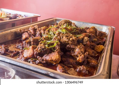 Malaysian Dish Rendang Ayam Or Dry Curry Chicken In A Steel Pot