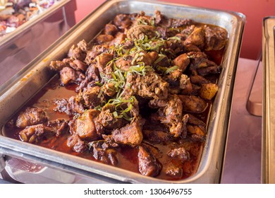 Malaysian Dish Rendang Ayam Or Dry Curry Chicken In A Steel Pot