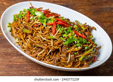 Malaysian popular dish stir fried noodles or locally known as Mee Goreng. Selective focus.
 - Shutterstock ID 1943771239