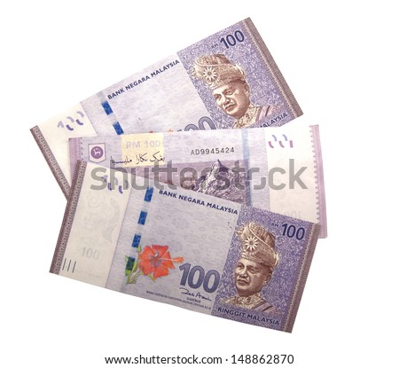 Malaysian Ringgit currency in the form of 100 Ringgit notes.