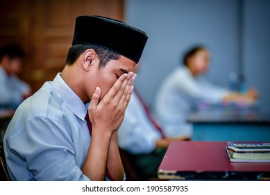 Malaysian Students Pray Before Answering The Final Exam.