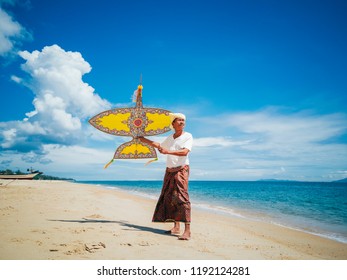 Malaysian Traditional Wau Or Moon Kite On The Beach