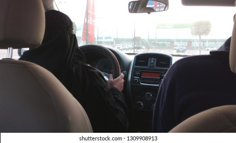 Malaz, Riyadh / Saudi Arabia - February 10 2019: Saudi Women Driving A Car  