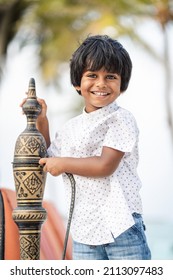 Maldives, Male' -  April 02, 2020: Young Boy Standing In A Cabana With A Beautiful Smile 
On His Face