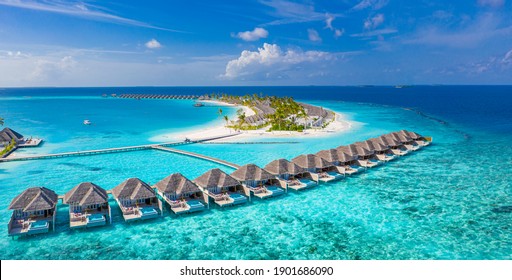 Maldives paradise scenery. Tropical aerial landscape, seascape with long jetty, water villas with amazing sea and lagoon beach, tropical nature. Exotic tourism destination banner, summer vacation