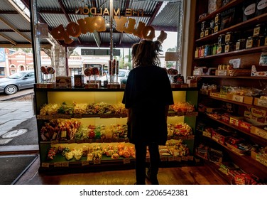 Maldon, Victoria, Australia - September 2022: A Kid In A Candy Store...making Hard Choices In The Maldon Lolly Shop, Stocking Old-fashioned Sweets From Humbugs To Licorice And Jelly Beans.