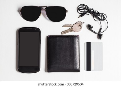male accessories on white table. mock up. top view. - Powered by Shutterstock