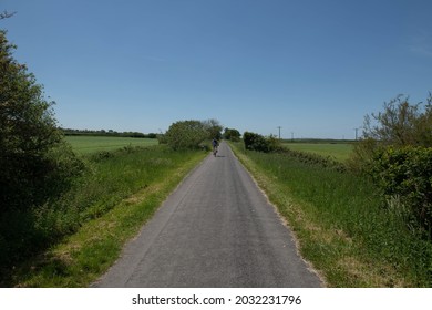 Male Adult Man Cycling Along The Tarka Trail On The South West Coast Path At Fremington Quay Between Barnstaple And Instow On The North Devon Coast, England, UK