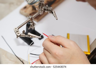 Male Artist Works Solder Wire