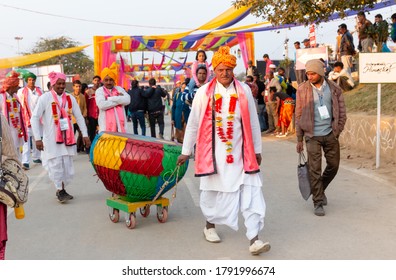 Male Artists Of Folk Music Their Drums Wear Ethnic White Dress And Colorful Turban At Surajkund Craft Fair, Faridabad, Haryana, India, February 2020