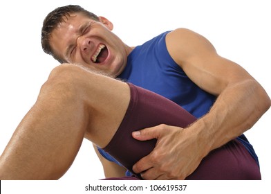 Male Athlete Clutching His Hamstring In Excruciating Pain On White Background