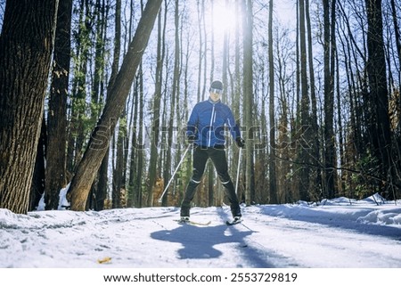 Similar – Young man running outdoors during workout in a forest