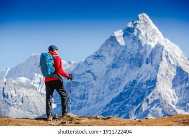 Male Backpacker Enjoying The View On Mountain Walk In Himalayas. Ama Dablam Mountain View.Travel, Adventure, Sport Concept