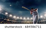 A male baseball player performs a dramatic play on the baseball stadium. He wears unbranded sport clothes. The stadium is made in 3D.
