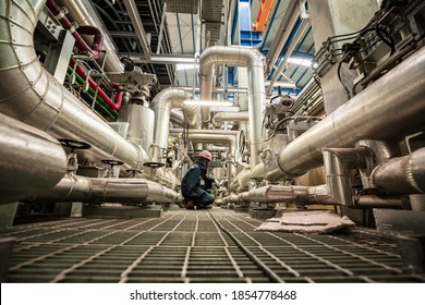 Male to be worker visual inspection inside control room valve and pipeline power plants